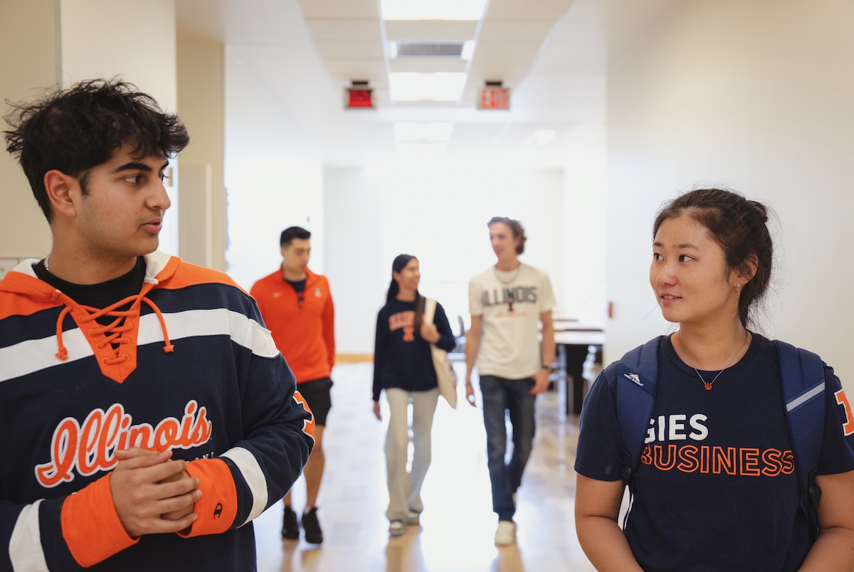 Students walking in the BIF hallway.