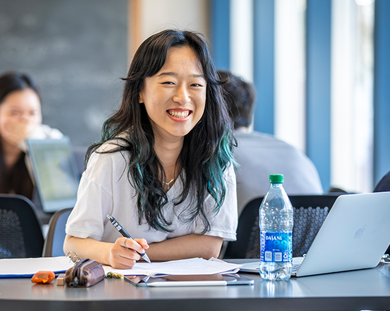 university of illinois student studying at table student studying at university of illinois